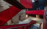 Vibrant pink staircase in the new foyer Courtyard of the Citizens Theatre