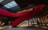 Vibrant pink staircase in the new foyer Courtyard of the Citizens Theatre